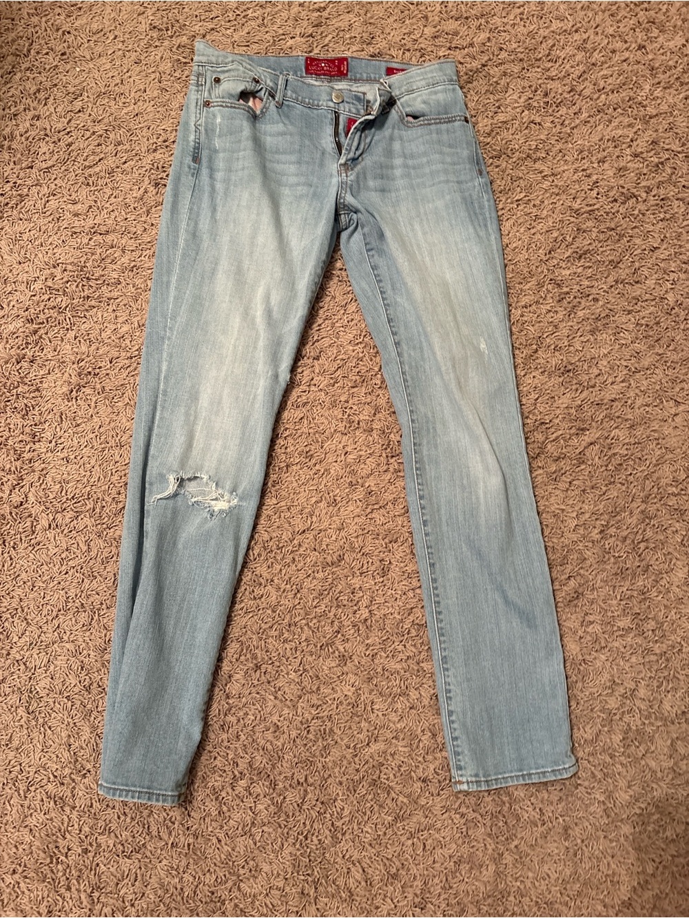 Lucky Brand Low Rise Light Blue Skinny Jeans with Knee Distress
